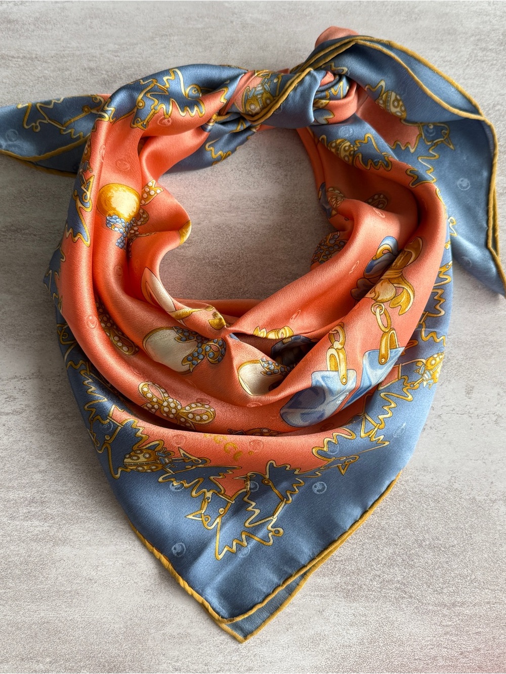 Nina Ricci Coral Scarf with Blue and Gold Jewelry Motifs